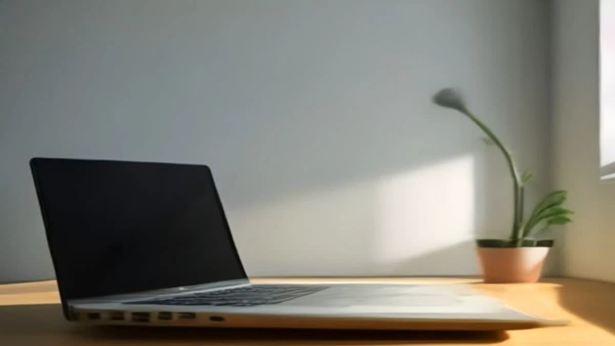 slight low angle of a bright minimal desk with a laptop and a smartphone showing an abstract rising line chart, soft morning light — illustrative photograph for this article